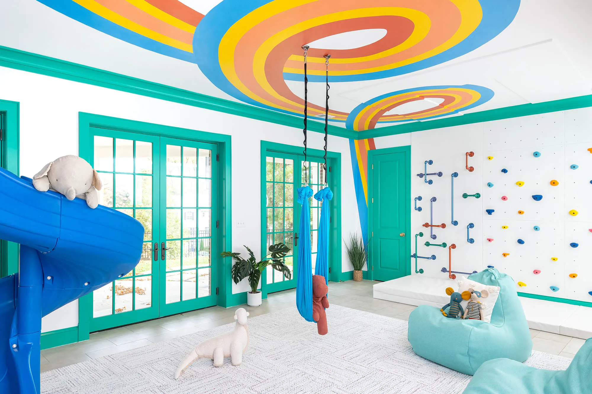 Arlington playroom with a colorful ribbon mural crossing the ceiling