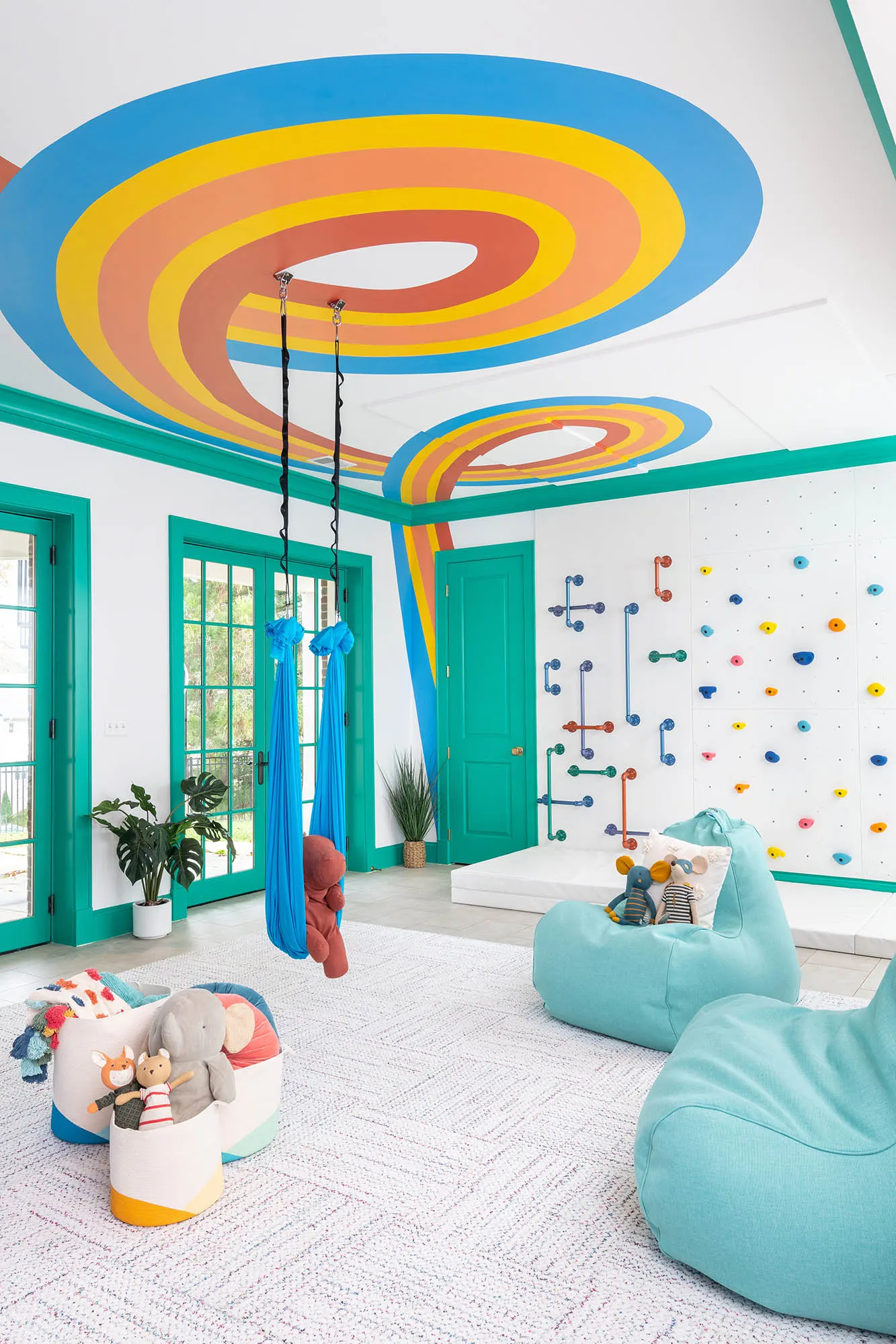 Orange and yellow ceiling loops above the Arlington play area