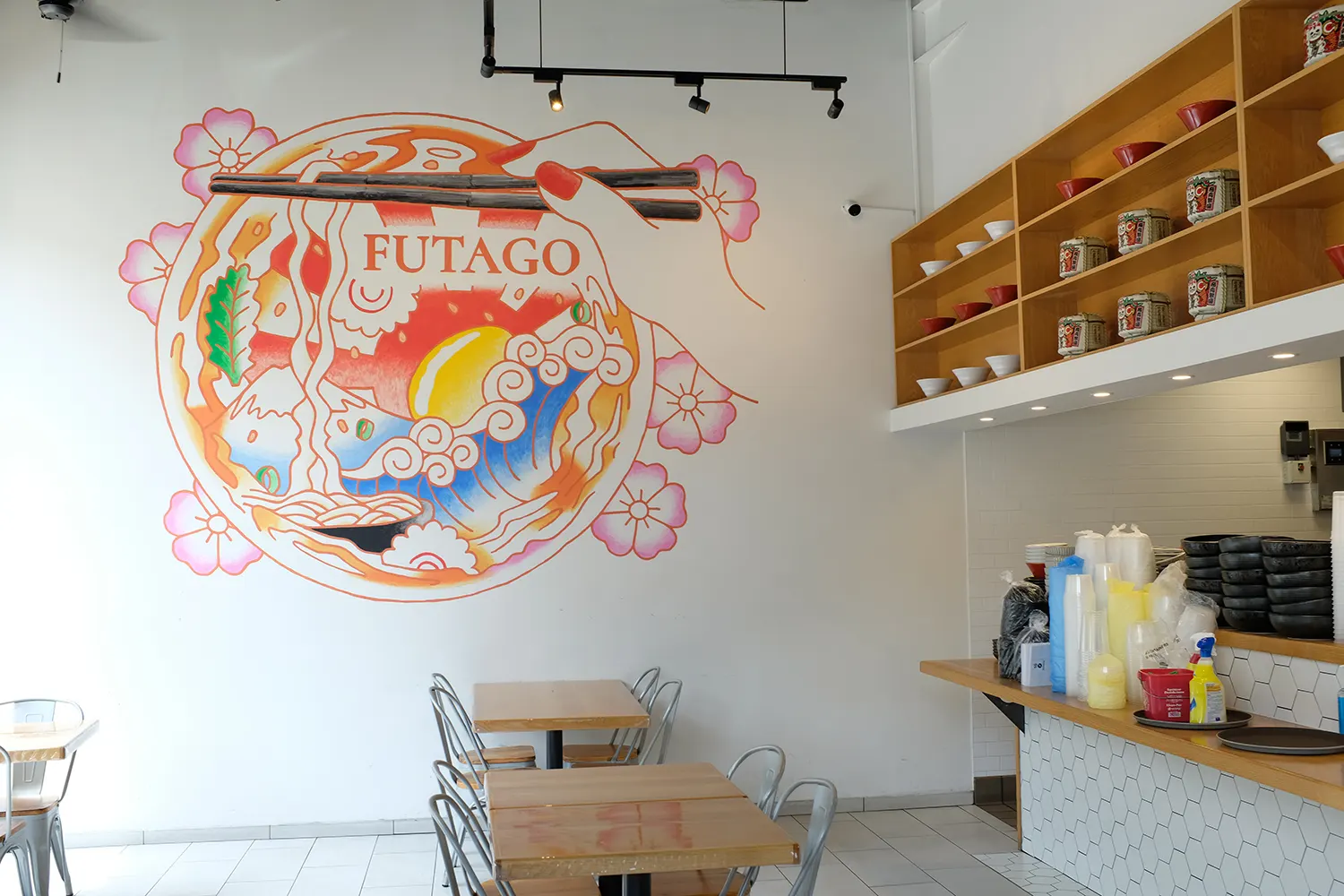 Fantastical udon bowl mural with Mount Fuji, a curling wave, egg, and cherry blossoms