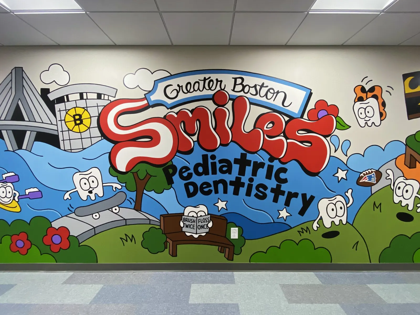 Finished Greater Boston Smiles pediatric dental mural with Boston landmarks and playful tooth characters