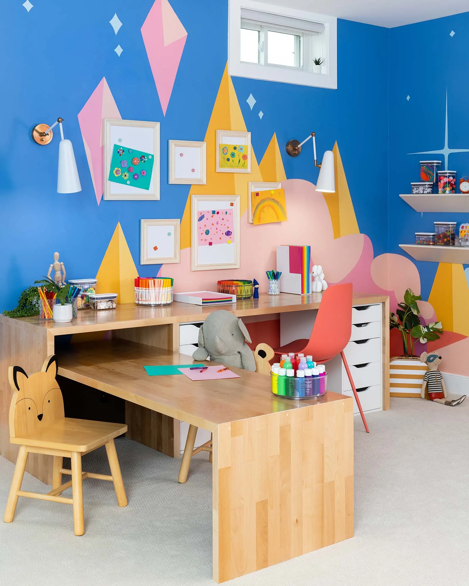 Children's art desk beneath the Fairfax castle mural