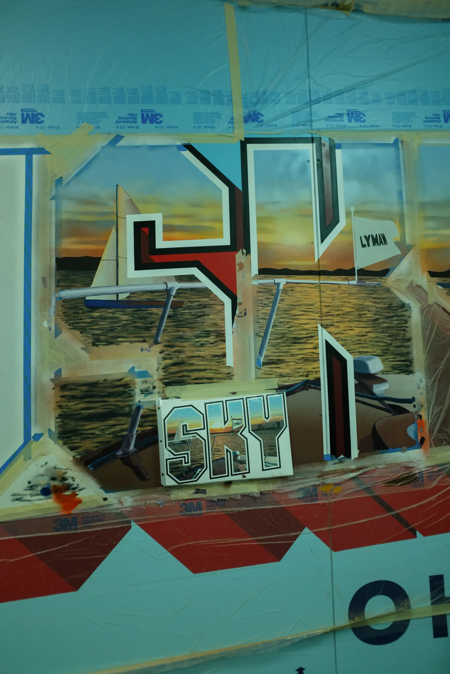 Close view of hand-painted Sandusky letter details in progress