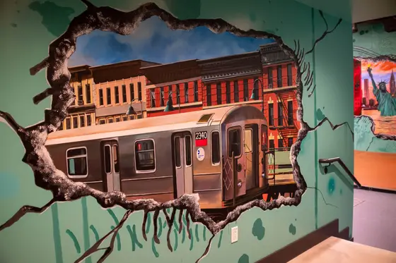 A large-scale hand-painted indoor skatepark mural that signals the studio's ability to deliver ambitious amenity environments.