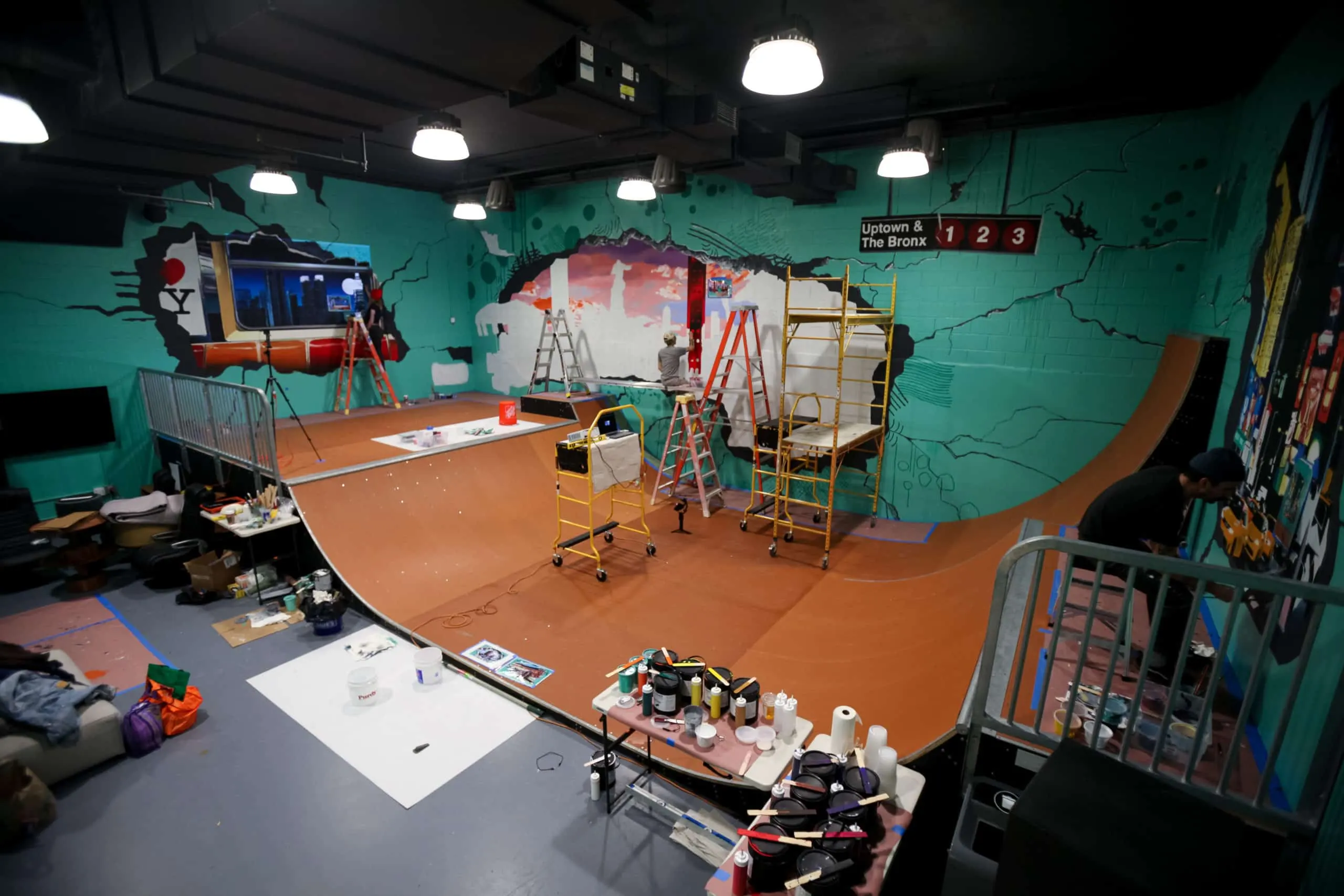 Wide overhead view of the Waterline skatepark murals during production
