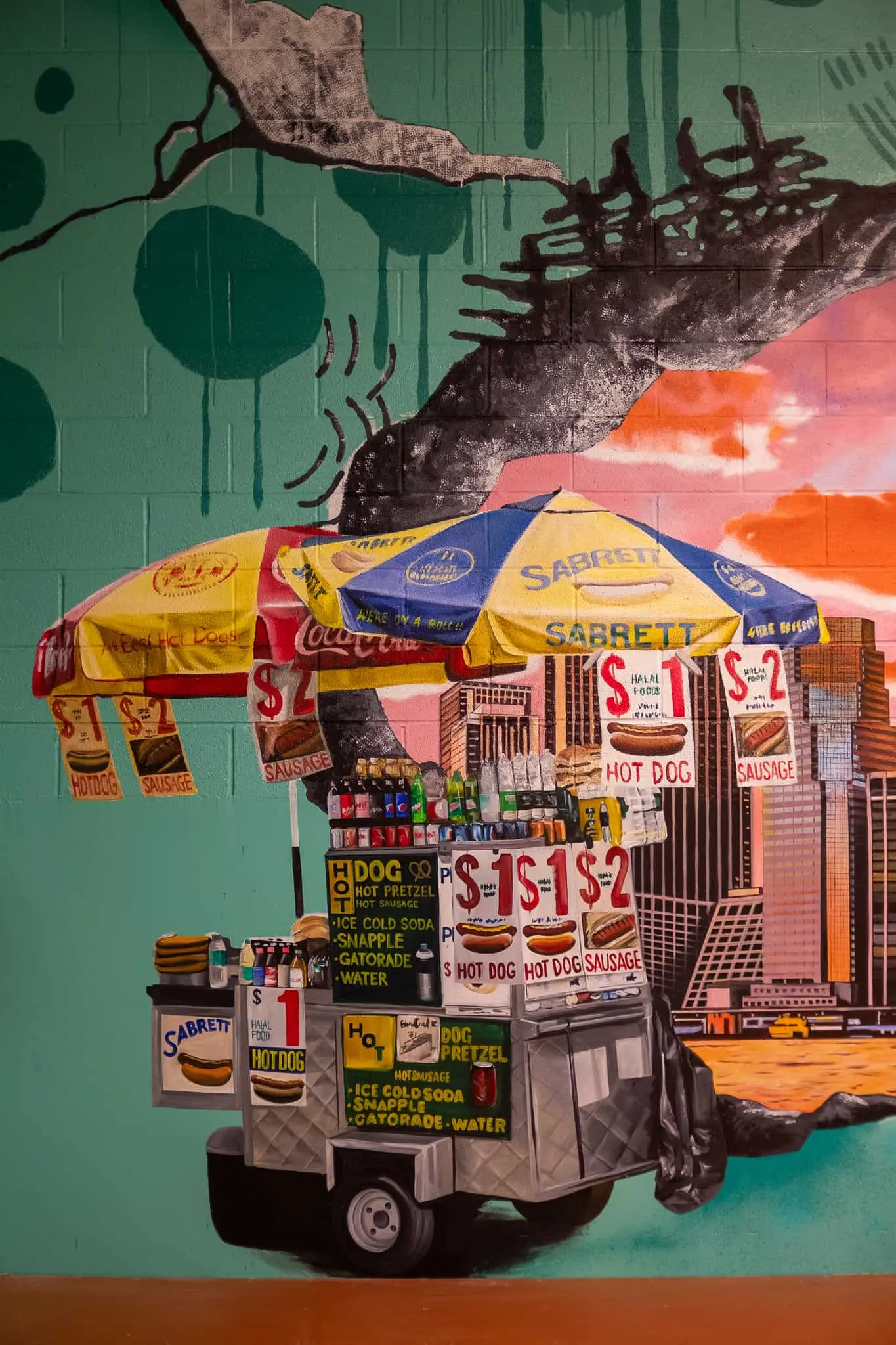 Finished Sabrett hot dog cart painted against a sunset sky