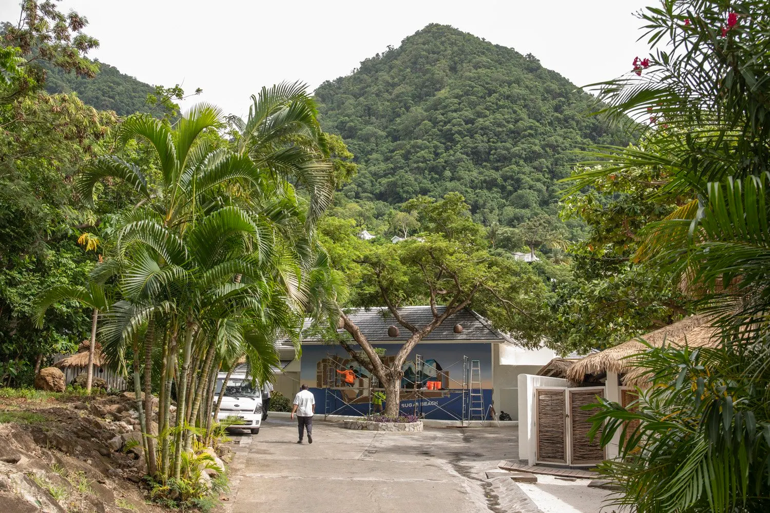 Sugar Beach landscape with the Pitons rising behind the mural site
