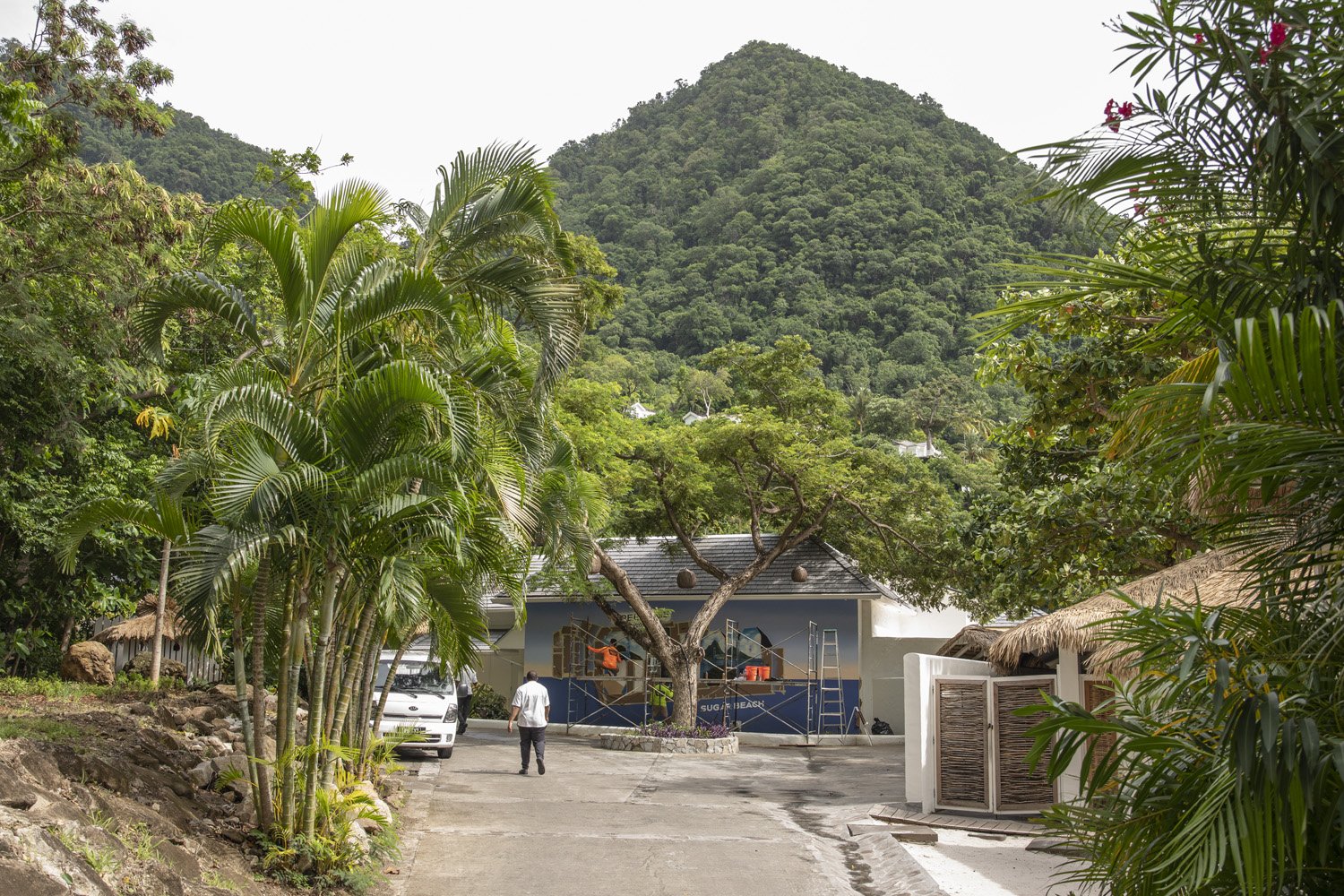 Mural work in progress with St. Lucia Piton in background
