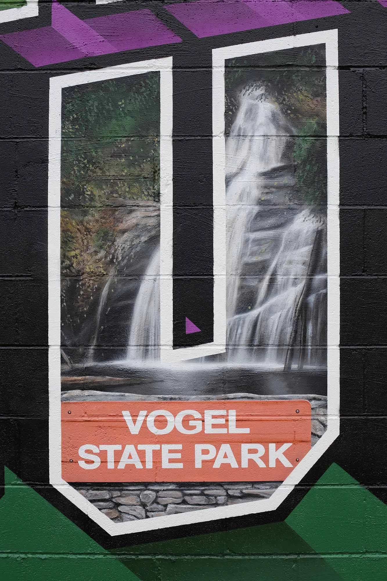 Vogel State Park and Helton Creek Falls painted inside the letter U