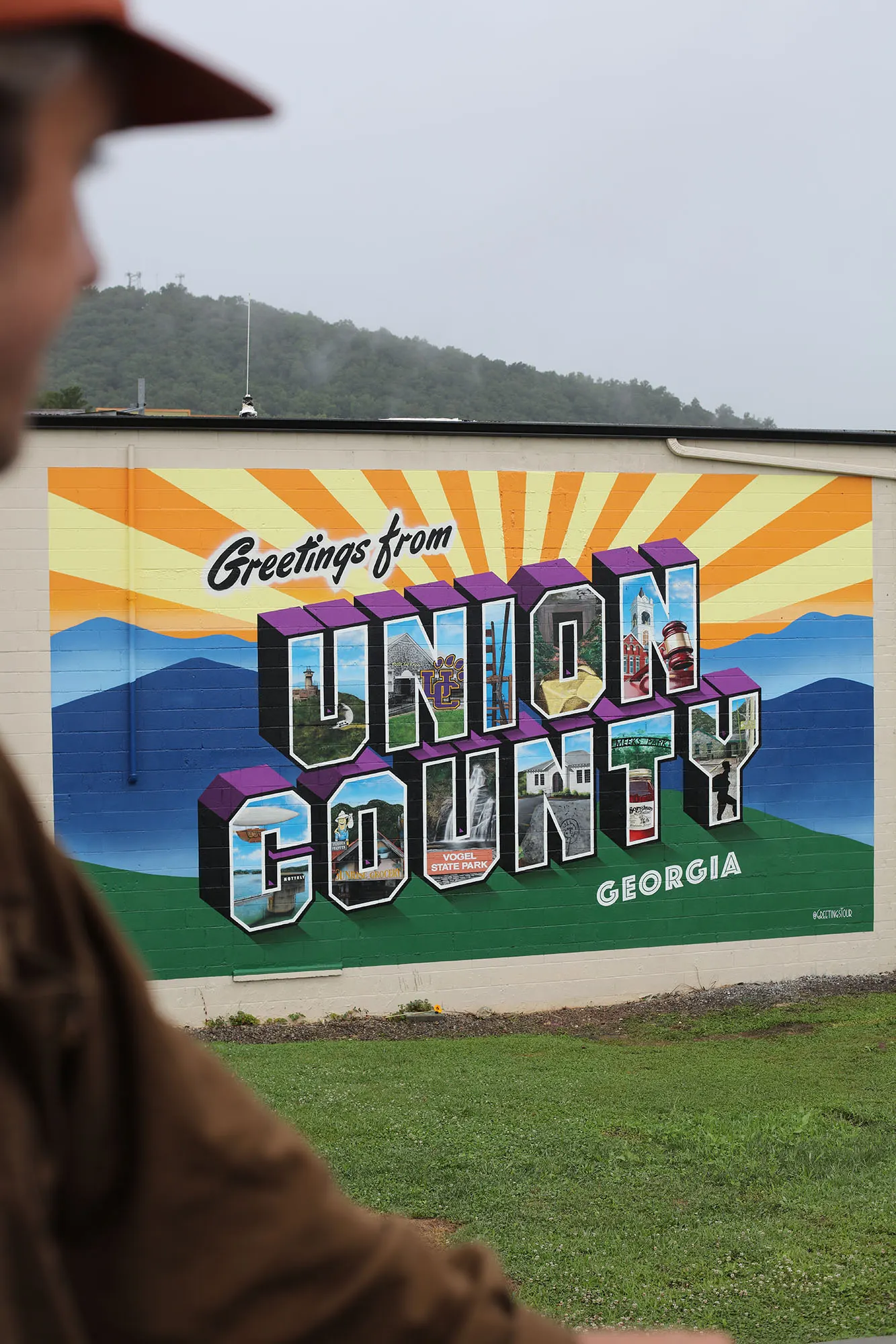 Completed Union County mural viewed from across the lawn